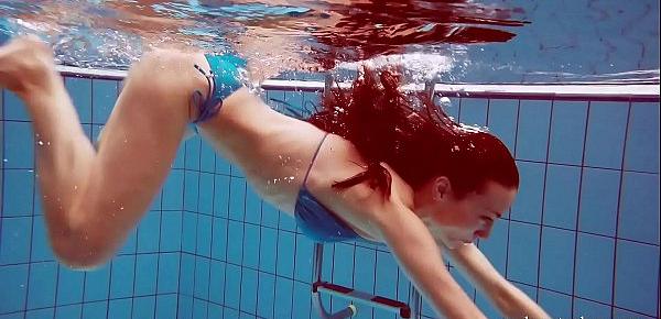  Hot teen Martina swims naked underwater